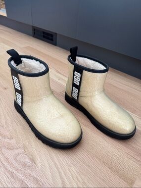 UGG Cream Shearling Ankle Boots with Black Accents